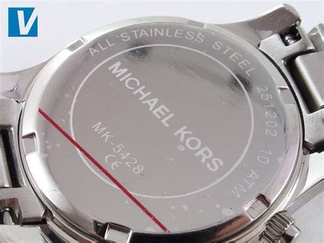 how do you tell a fake michael kors watch|michael kors watch face.